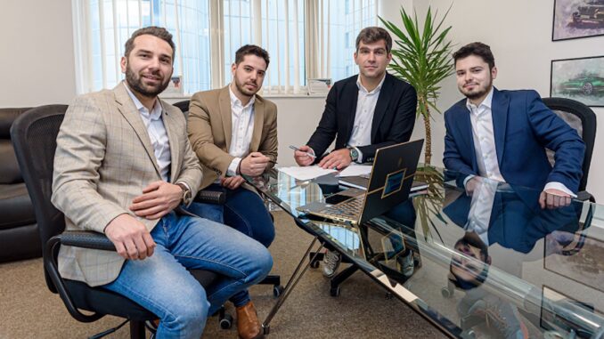 Flavian Popescu (stanga), Mircea Matei, Ovidiu Toma (CEO CryptoDATA Tech), Andrei Stănescu (dreapta)